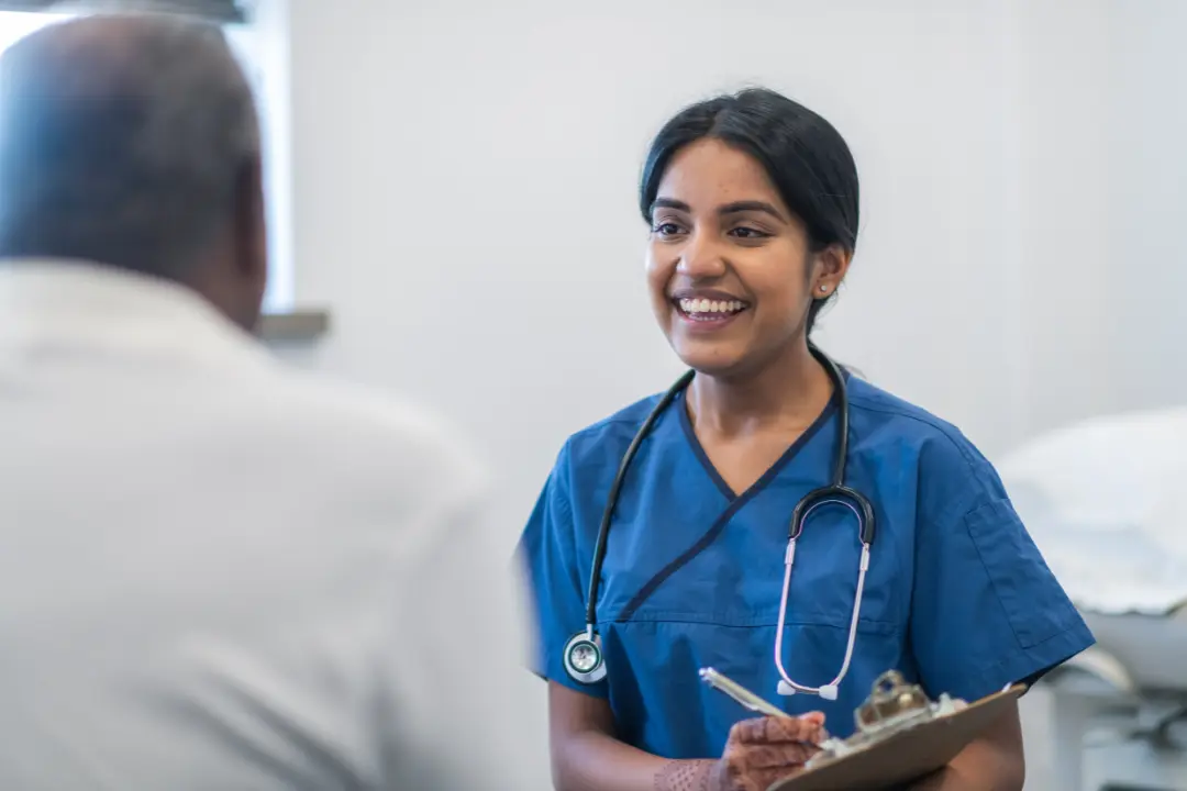 Doctor talking with a patient at a Fiftyco Labs clinic